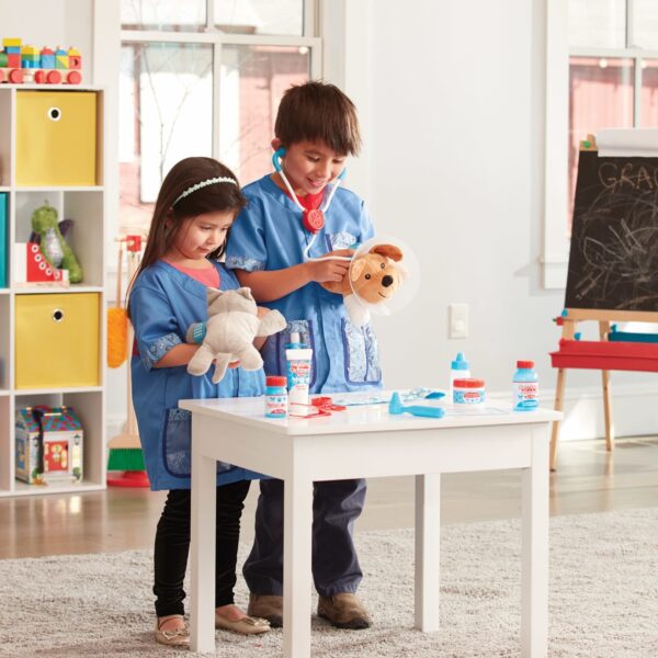 Melissa & Doug Examine & Treat Pet Vet Play Set - Image 4